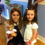 Princess Beatrice with one of the children at the Hospital