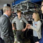 The Duke with Post-Doctoral students in the Quantum Mechanics Laboratory.