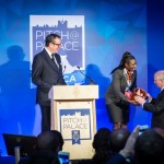 Perez Ochieng from Sacoma presents The Duke of York with a gift of sweet potatoes at Pitch@Palace Africa.